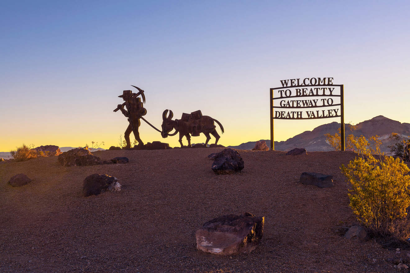 statue of mining man with donkey